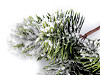 Künstlicher Nadelbaumzweig schneebedeckt
