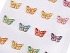 Samolepicí motýlci na lepicím proužku