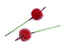 Artificial frosted apples on a wire