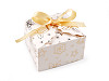 Christmas gift box with gold print and ribbon