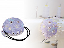 Pincushion with an elastic band for a sewing machine