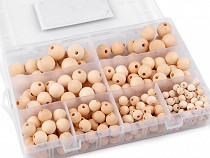 Ensemble de perles en bois dans une boîte