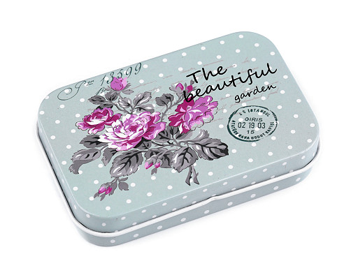 Caja de hojalata con flores de prado