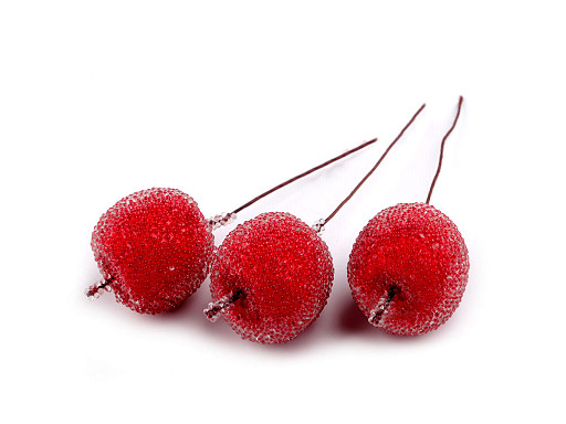 Artificial frosted apples on a wire