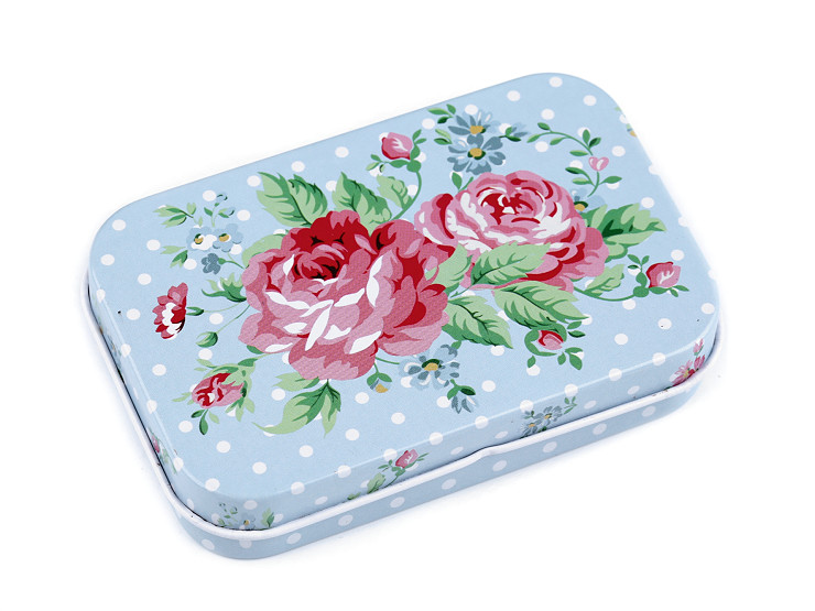 Caja de hojalata con flores de prado
