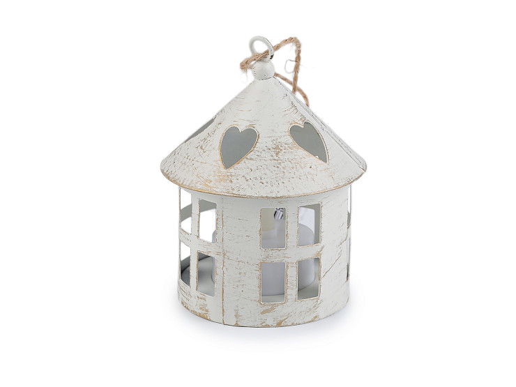 Kovová lucerna svítící k zavěšení