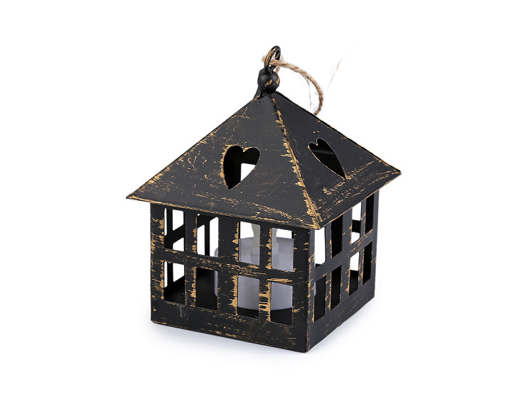 Kovová lucerna svítící k zavěšení